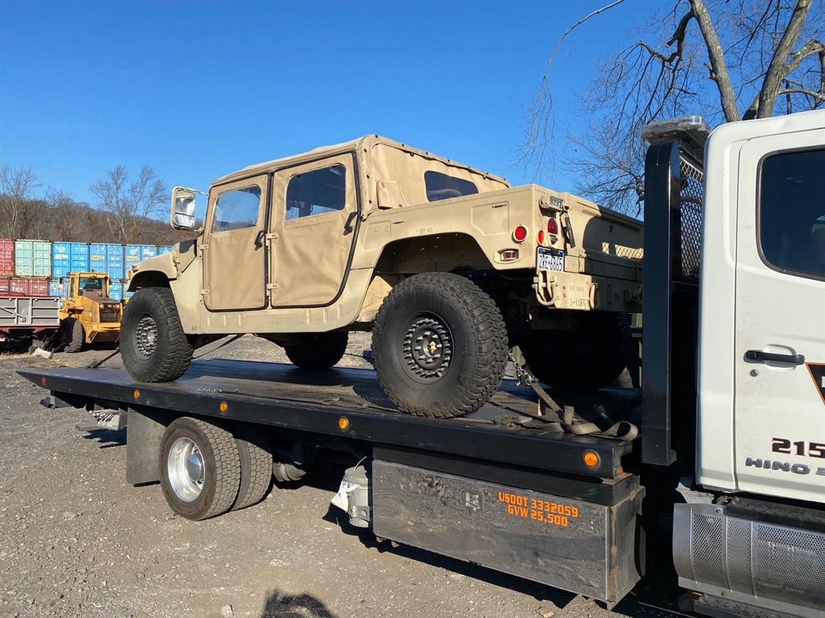 3643ea47-d3e4-4982-bc06-5c21b34bced6-12272022-cropped-Tan%20HMMWV%201