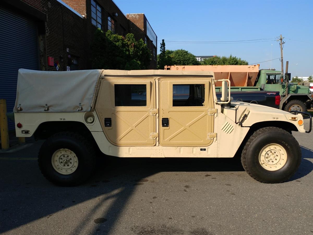 5182aa9a-86ec-407c-b0af-59c351ce51ad-01312019-cropped-Customer%20Tan%20HMMWV%20service%20(4)