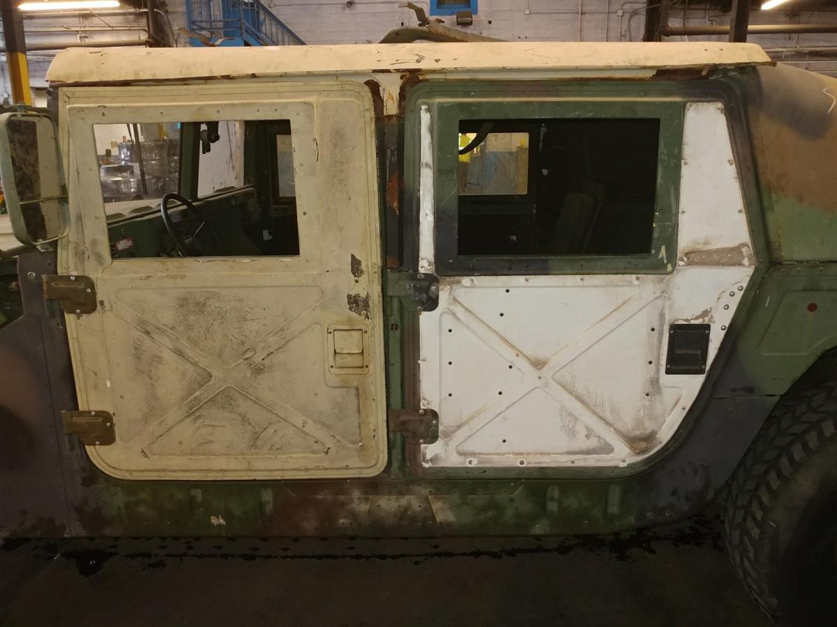 a64230d9-852d-4f47-9c1d-840f7080ad28-02132019-cropped-2-HMMWV%20Slantback%20Installation%20(1)