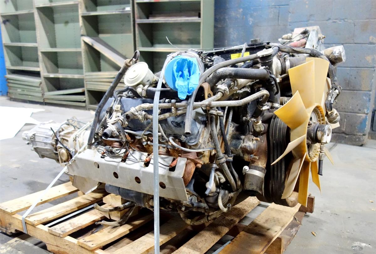 HM-698 | 6.2 Liter GM Diesel Engine with 3 Speed Automatic Transmission and Transfer Case USED (4).JPG