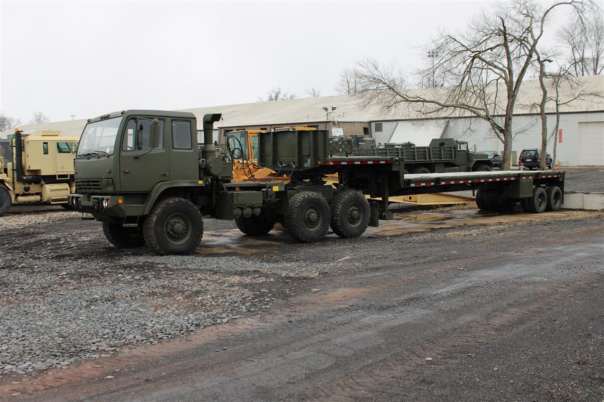 T-01032025-1 | FMTV M1088 Tractor and M871A3 Flatbed Tractor (1).jpg