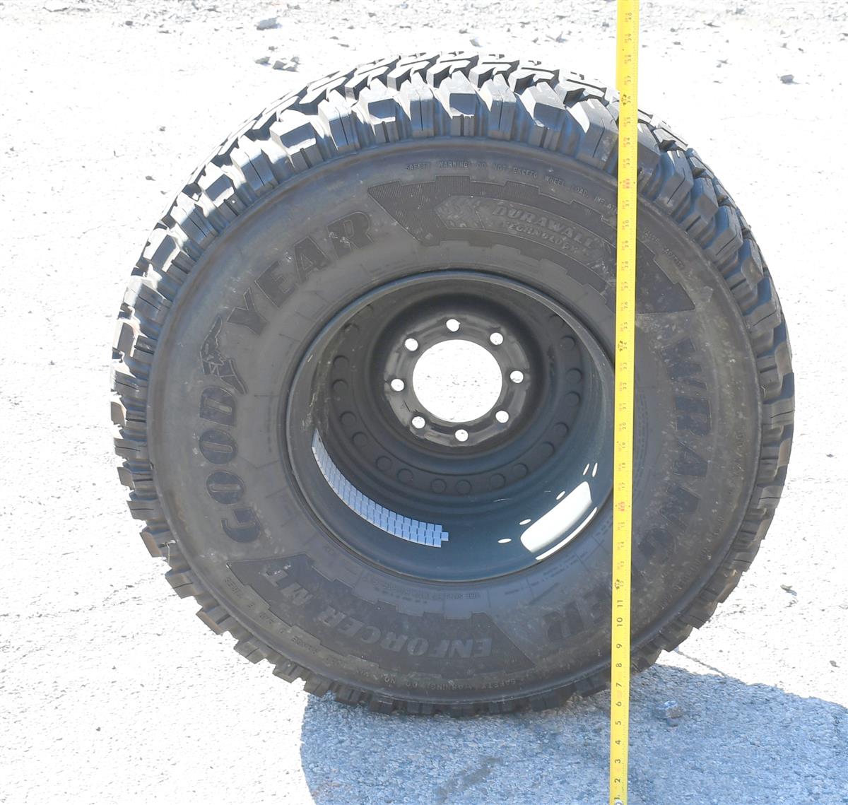 TI-1876 | TI-1876  Goodyear Wrangler Enforcer MT 37x12.50R16.5LT Mounted on 24 Bolt Rim 100% Tread HMMWV (1).JPG